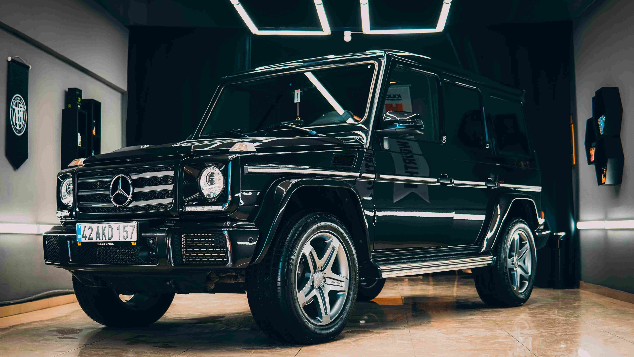 Luxury black Mercedes-Benz G-Class after premium car detailing and ceramic coating in Lake Norman, NC, showcasing a high-gloss finish and pristine condition.